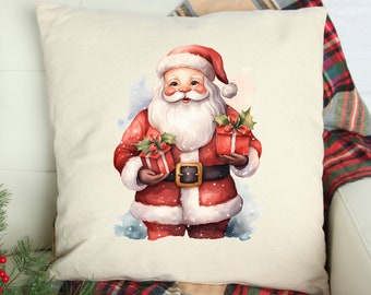 May include: A square, off-white pillow with a watercolor illustration of Santa Claus holding two wrapped gifts. Santa is wearing a red suit with a black belt and a white beard. The gifts are red with green holly accents. The pillow is on a white couch.