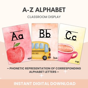 May include: Three printable cards for a classroom alphabet display. Each card features a watercolor background with an illustration and the letter 'A', 'B', or 'C' in black. The cards also include the phonetic representation of the letter, such as 'app', 'bus', and 'cup'.
