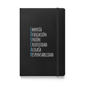 May include: Black notebook with a blue inscription that reads "EDUCAR" with the letters representing the words: Empatía, Dedicación, Unión, Creatividad, Alegría, Responsabilidad.