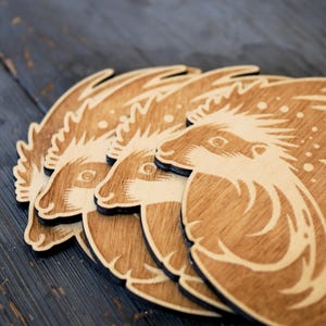 Set of 4 varnished wooden coasters, hedgehog shape