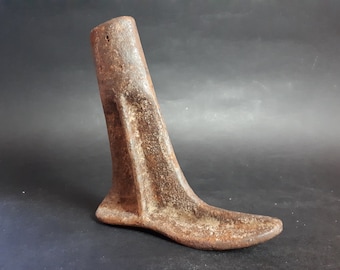 Forme de chaussure de cordonnier antique en fonte