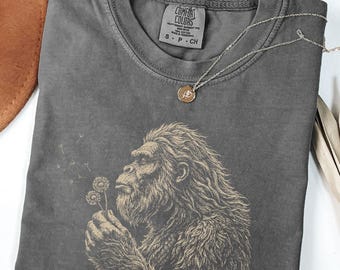 Comfort Colors® Bigfoot Dandelion Shirt, Vintage Sasquatch Nature Tee, Woodland Cryptid Graphic Tee, Outdoor Adventure Shirt, Chaotic Shirt