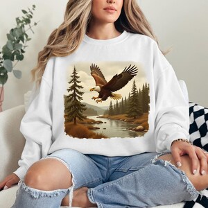 Retro Bald Eagle River Scene Sweatshirt, 90s Birds Of Prey Forest Nature Outfit, Boho Unisex Crewneck Sweatshirt, Nature Camping Shirt image 2