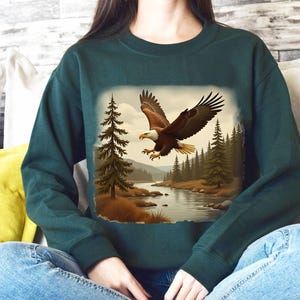 Retro Bald Eagle River Scene Sweatshirt, 90s Birds Of Prey Forest Nature Outfit, Boho Unisex Crewneck Sweatshirt, Nature Camping Shirt image 4