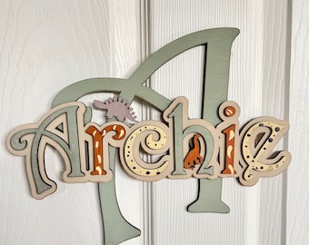 Personalised Dinosaur Name Sign: Wooden Nursery Decor, Dino door sign