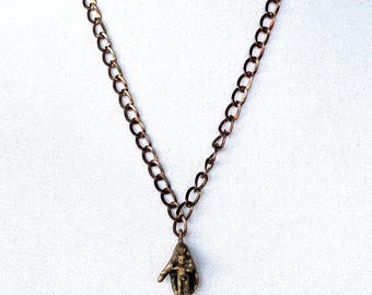 African Hand with Baby Boy Necklace