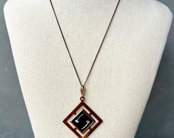 mid-century modern dandelion necklace