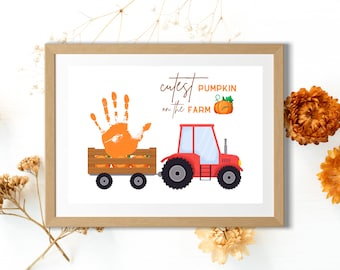 May include: A printable handprint art design featuring a red tractor pulling a wagon full of orange pumpkins. The text "Cutest Pumpkin on the Farm" is written above the tractor.
