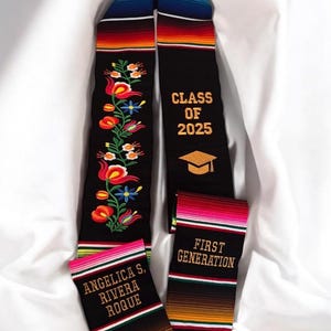 May include: A set of three ceramic mugs with a speckled, matte finish. The mugs are in cream, light grey, and dark grey. Each mug has a simple, minimalist design, ideal for coffee or tea.