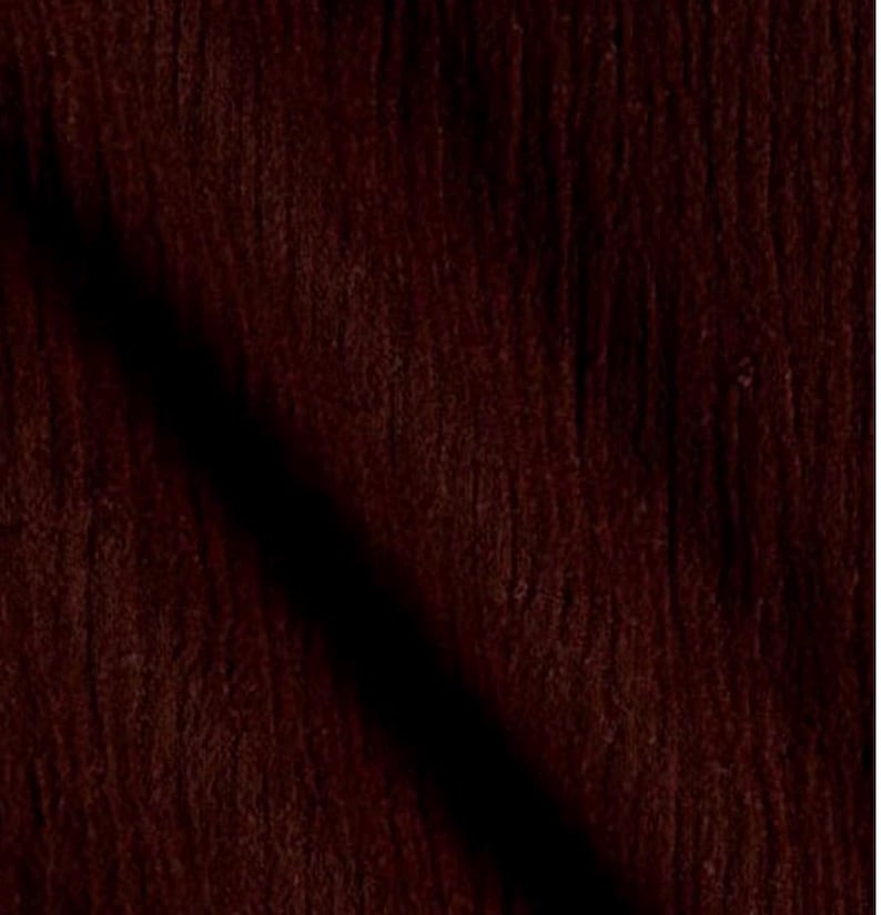 May include: A dark brown fabric with a visible vertical grain texture. The material features a deep, rich mahogany colour with subtle variations in tone across the surface, creating a consistent, linear pattern throughout the textile material.