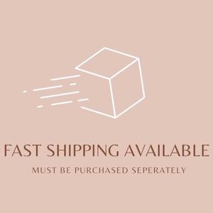 May include: A white outline of a cube with speed lines, suggesting fast shipping, is set against a muted pink background. The text "FAST SHIPPING AVAILABLE" and "MUST BE PURCHASED SEPERATELY" are below the graphic.