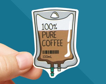 May include: A sticker featuring a cartoon IV bag filled with coffee. The bag is labeled "100% Pure Coffee" with a barcode and "100mL" printed below. The sticker has a white border and is held against a teal background.