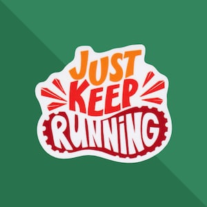 May include: A white sticker with the text "JUST KEEP RUNNING" in orange and red. The text is in a stylized font with a running shoe sole design around the word "RUNNING". The background is a gradient of green.