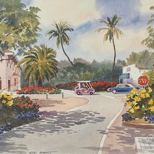 May include: A watercolor painting of a street scene with a pink building, palm trees, a golf cart, a car, and a bench. The street is lined with flowers and there is a stop sign in the distance.