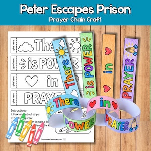 May include: A paper craft kit titled Peter Escapes Prison Prayer Chain Craft, featuring a printable sheet with instructions, five colourful crayons, and several paper strips assembled into a chain with the text There is power in prayer.