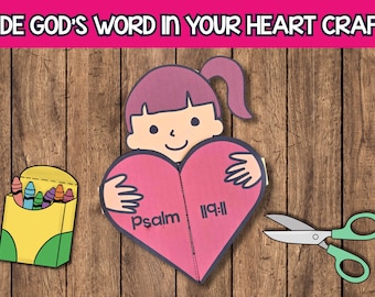 May include: A craft project with the text "HIDE GOD'S WORD IN YOUR HEART CRAFT". The project includes a girl holding a pink heart with "psalm 119:11" printed on it, a box of crayons, and scissors.