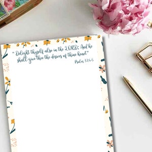 May include: A printable floral design with a white background and a border of yellow and pink flowers. The text in the center reads "Delight thyself also in the LORD; And he shall give thee the desires of thine heart" Psalm 37:4-5.