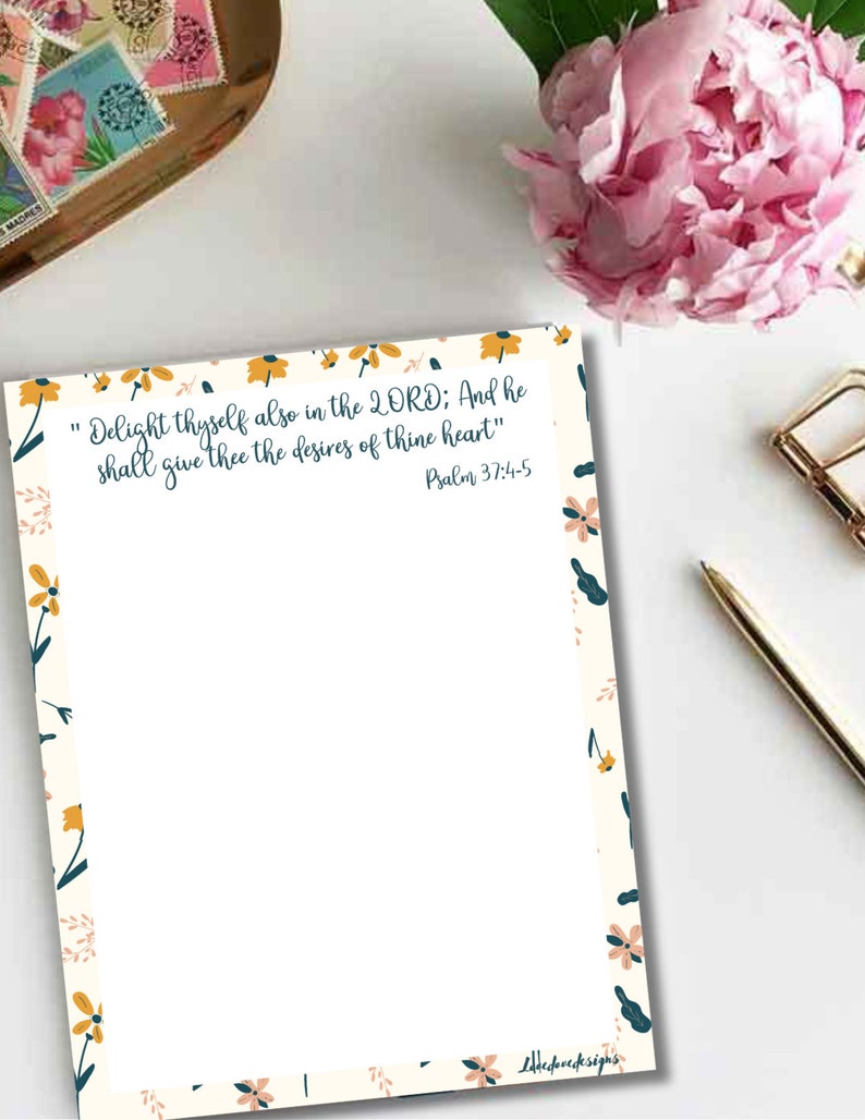 May include: A printable floral design with a white background and a border of yellow and pink flowers. The text in the center reads "Delight thyself also in the LORD; And he shall give thee the desires of thine heart" Psalm 37:4-5.