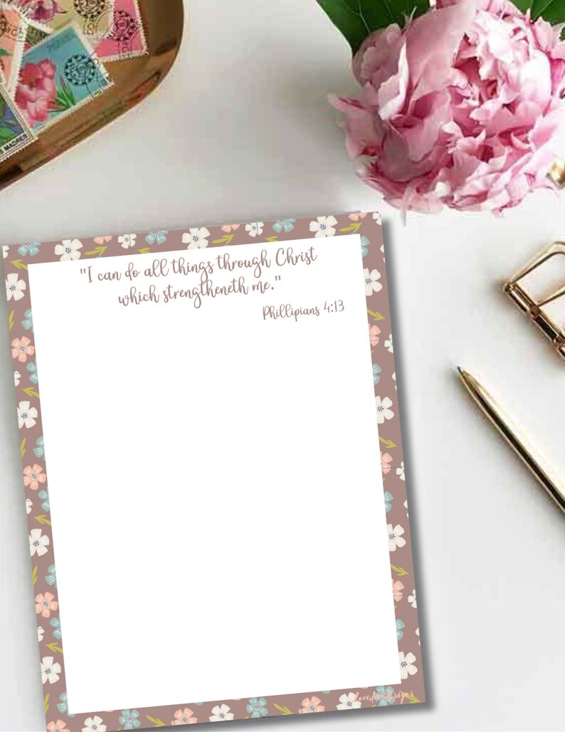 May include: A printable sheet of paper with a floral border and a quote from Philippians 4:13, "I can do all things through Christ which strengtheneth me."