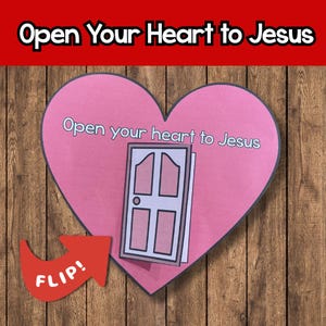 May include: A pink heart-shaped card with the text "Open Your Heart to Jesus" and a drawing of a door. An arrow with the word "FLIP!" points towards the door. The background is a wooden surface.
