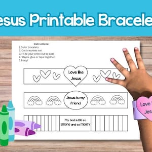 May include: A printable sheet with the text "Jesus Printable Bracelets" and instructions for making bracelets. The sheet includes bracelet designs with hearts, rainbows, and the phrases "Love like Jesus" and "Jesus is my friend." Crayons are visible.