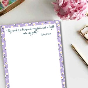 May include: A printable sheet of paper with a light purple background and a white daisy border. The text reads "Thy word is a lamp unto my feet, and a light unto my path." Psalm 119:105