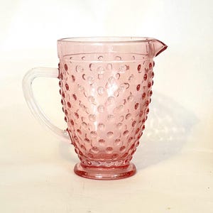 Vintage Pink Depression Glass Pitcher with Thumbprint Coin Dot Pattern and clear handle. Mid Century Glassware