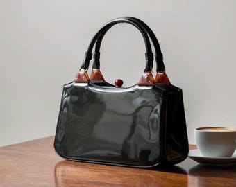 Vintage Garay Patent Leather Handbag Kelly Style Black Lucite Accents 1950s Structured Frame Purse Red Clasp Mid Century
