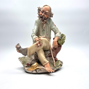 Vintage Capodimonte Porcelain Figurine Statue Seated Hobo Tramp with Cane - Signed by Pezzato - Made in Italy