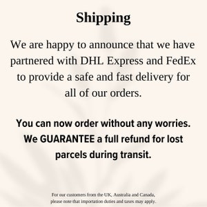 a sign that says shipping we are happy to announce that we have returned with dh