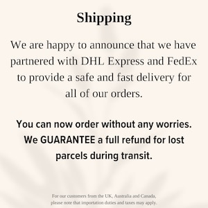 a sign that says shipping we are happy to announce that we have returned with dh