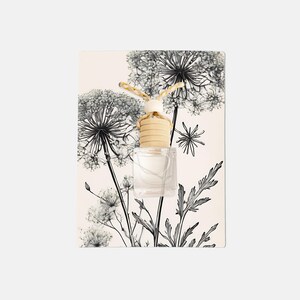 May include: A clear glass bottle with a wooden cap and a string hanging from it. The bottle is hanging from a floral design on a white background.