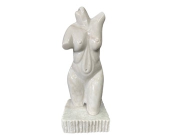 Woman sculpture in marble