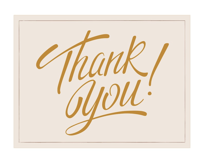 May include: A rectangular card with a cream background and a thin, light brown border. The words "Thank You!" are written in elegant, gold-colored script across the center of the card.