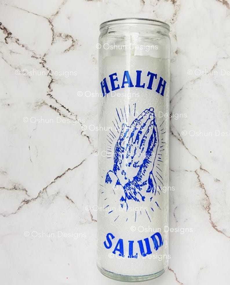 May include: A white ceramic mug with a black handle and the text "But First, Coffee" in a bold, black font. The mug is sitting on a wooden surface. The mug is approximately 4 inches tall.