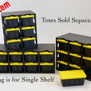 May include: Black storage shelves with yellow-lidded bins. The image shows multiple shelves, each holding several bins. The text "New Item" is in the upper left corner. The text "Totes Sold Separately" is in the image. The text "Listing is for Single Shelf" is in the image.