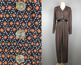 Brown and black long sleeve 80s jumpsuit with big gold buttons, Fits like size XS/S, Bust 38, Waist 30, Hips 36