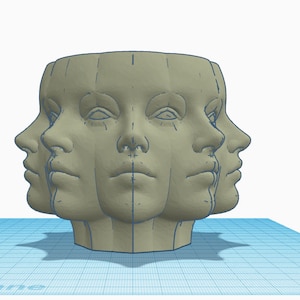 Puede incluir: Una escultura impresa en 3D de cuatro caras, cada una mirando en una dirección diferente, formando una forma circular. La escultura está hecha de un material marrón claro y tiene un acabado liso y mate.