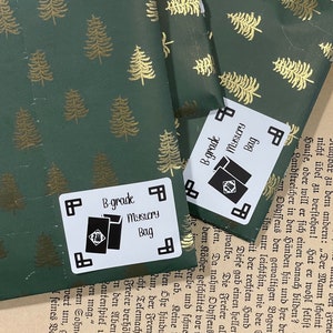 Sac à main mystère - Oups, paquet d'autocollants - Signets livresques surprises - Cadeau de planification confortable - Cadeau de moins de 10 ans