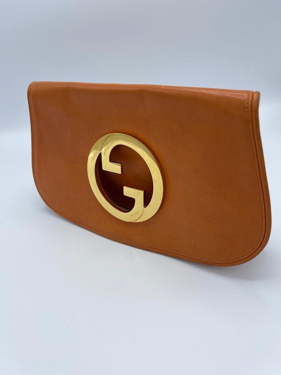 GUCCI orange clutch