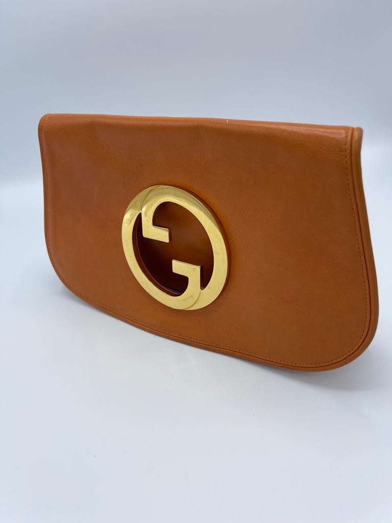 Gucci Orange Clutch