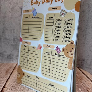 Puede incluir: Un bloc de notas Baby Daily Log con secciones para alimentación, pañales, sueño, medicamentos y juegos. El diseño incluye ilustraciones de ositos de peluche marrones, un biberón, un pañal y un frasco de medicina sobre fondo crema.