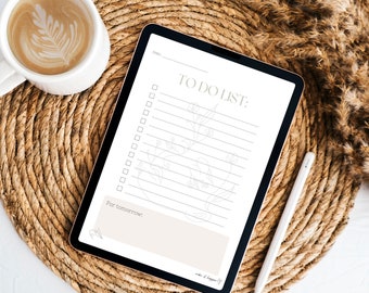 May include: A digital tablet with a to-do list template on the screen. The template features a simple floral design and a section for "For tomorrow". A white stylus is lying next to the tablet on a woven mat.