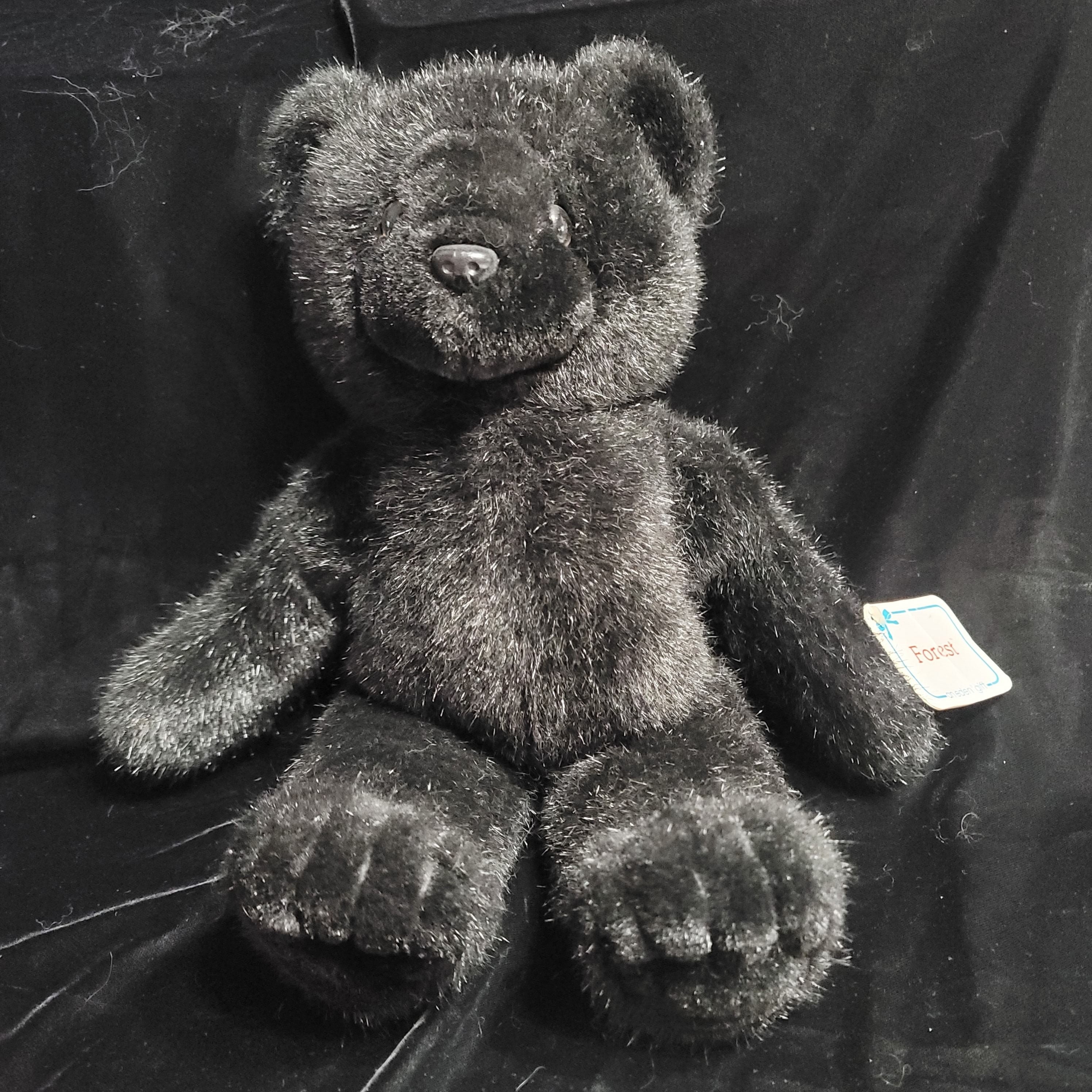 Black teddy bear cost sale