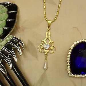 TITANIC - Collier à pendentif robe volante inspiré des roses