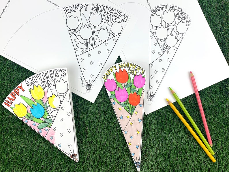 May include: Three printable Mother's Day cards featuring a bouquet of flowers. The cards are in the shape of a cone and have the text "Happy Mother's Day" on them. The flowers are outlined and ready to be colored in.