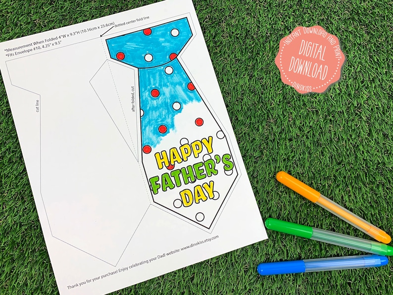 May include: Printable Father's Day card in the shape of a tie. The tie is blue with red and white polka dots. The card says "Happy Father's Day" in green and yellow letters.