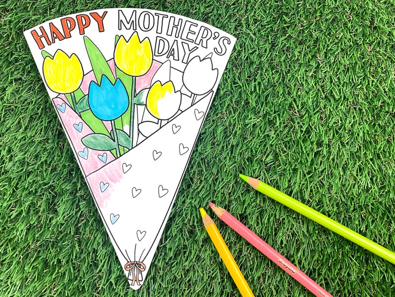 May include: A printable Mother's Day card shaped like a bouquet of flowers. The card is decorated with yellow, white, and blue tulips, green leaves, and pink hearts. The card says "Happy Mother's Day" at the top.