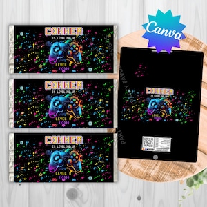 May include: Black candy bar wrappers with a colorful video game controller design. The wrappers feature the text "CONNER IS LEVELING UP" and "LEVEL 8". The design includes neon colors and a starry background.
