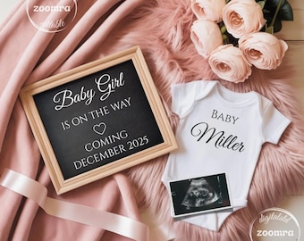May include: A baby announcement scene. A framed chalkboard reads "Baby Girl is on the way, coming December 2025." A white babygrow with "Baby Miller" printed on it, and a sonogram image are also present. The scene is set on a pink faux fur blanket with pink roses.